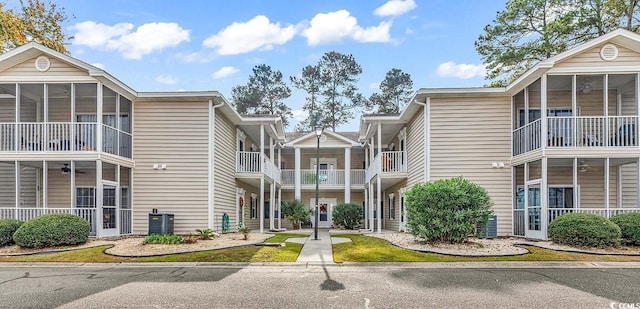 view of building exterior featuring central AC