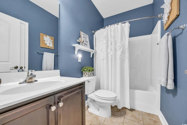 full bathroom featuring toilet, tile patterned flooring, vanity, and shower / tub combo with curtain