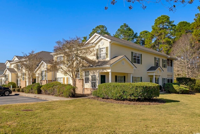 view of front of house with a front lawn