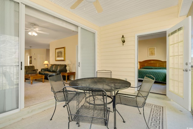 view of patio / terrace with outdoor dining area and a ceiling fan