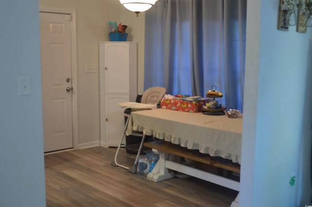 bedroom featuring dark hardwood / wood-style flooring