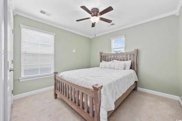 bedroom featuring baseboards, visible vents, and light colored carpet