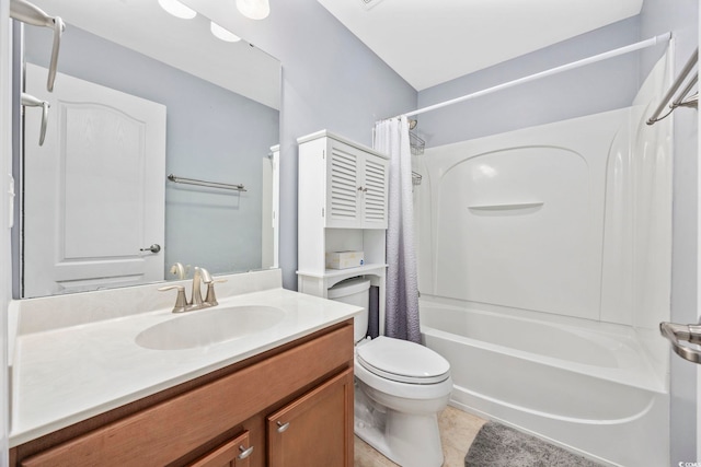 bathroom featuring shower / bath combo, tile patterned flooring, vanity, and toilet