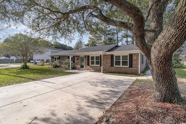 ranch-style house with a front yard