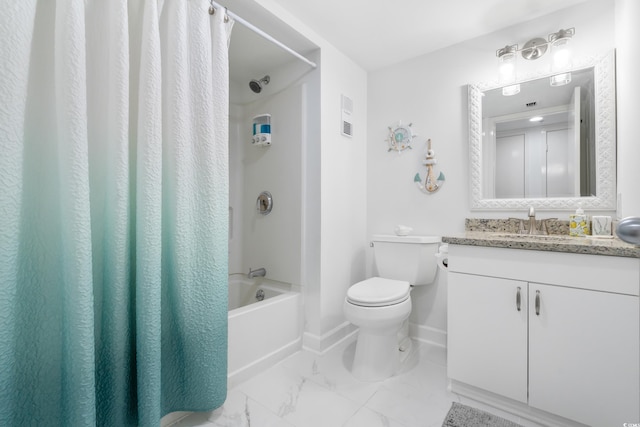 full bathroom featuring shower / bath combo, vanity, and toilet