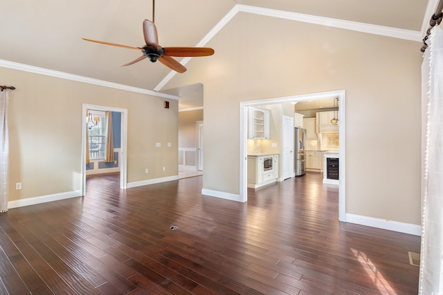 unfurnished living room with dark wood-style floors, ceiling fan, and crown molding