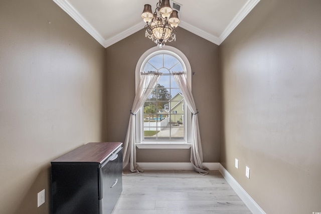 interior space featuring baseboards, visible vents, wood finished floors, crown molding, and a chandelier