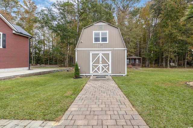 view of outbuilding featuring an outdoor structure