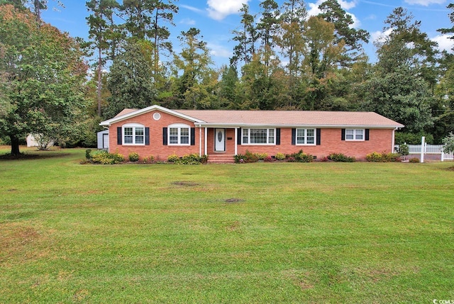 ranch-style house with a front lawn