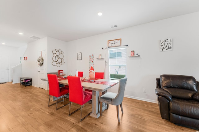 dining room featuring light wood-type flooring