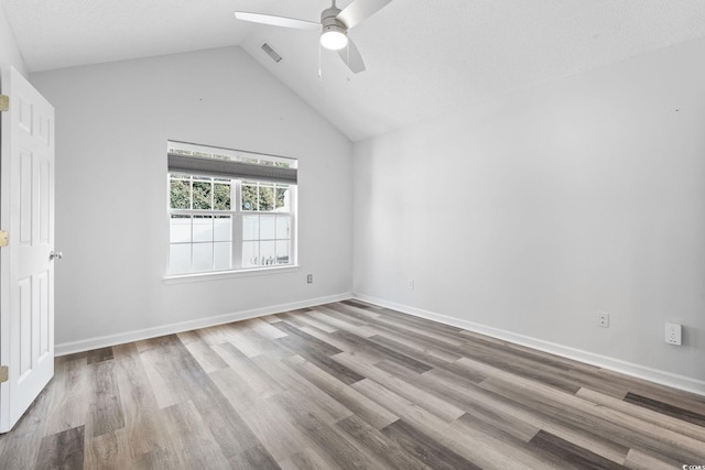 140 Wimbledon Way Unit 140, Murrells Inlet, SC 29576 - empty room featuring ceiling fan, wood finished floors, baseboards, and high vaulted ceiling