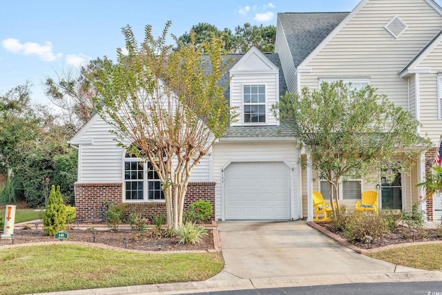 new england style home with a garage