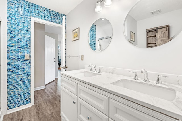 140 Wimbledon Way Unit 140, Murrells Inlet, SC 29576 - full bathroom with double vanity, wood finished floors, and baseboards