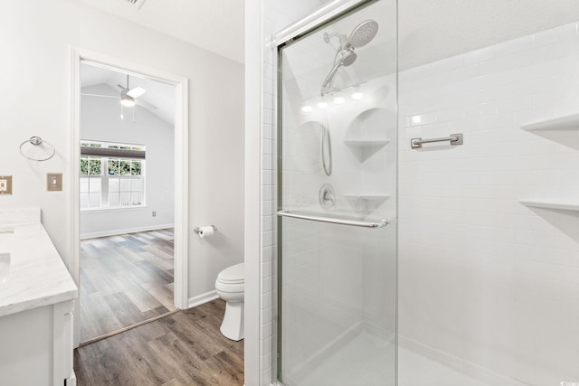140 Wimbledon Way Unit 140, Murrells Inlet, SC 29576 - full bathroom with wood finished floors, a shower stall, double vanity, toilet, and ceiling fan