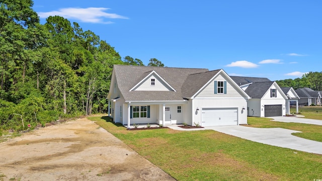 view of front facade featuring a front lawn and a garage