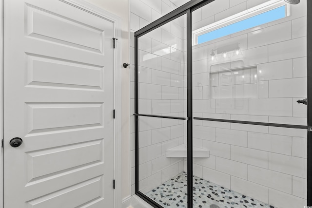 bathroom featuring walk in shower