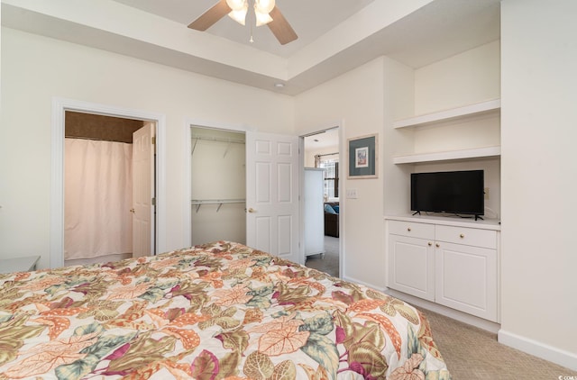 bedroom with light carpet and ceiling fan