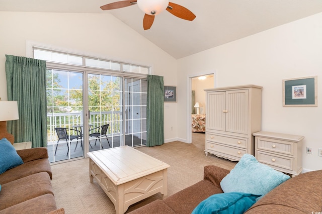 living room with ceiling fan, high vaulted ceiling, and light colored carpet