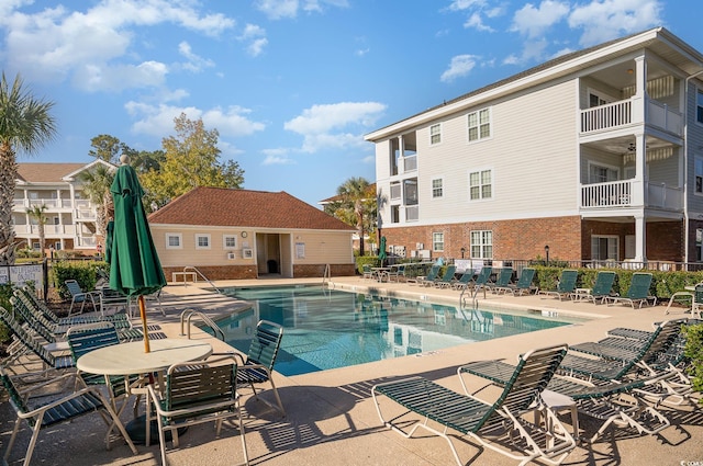 view of pool featuring a patio area