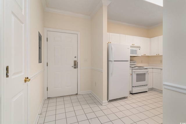 kitchen with white cabinets, white appliances, ornamental molding, and light tile patterned flooring