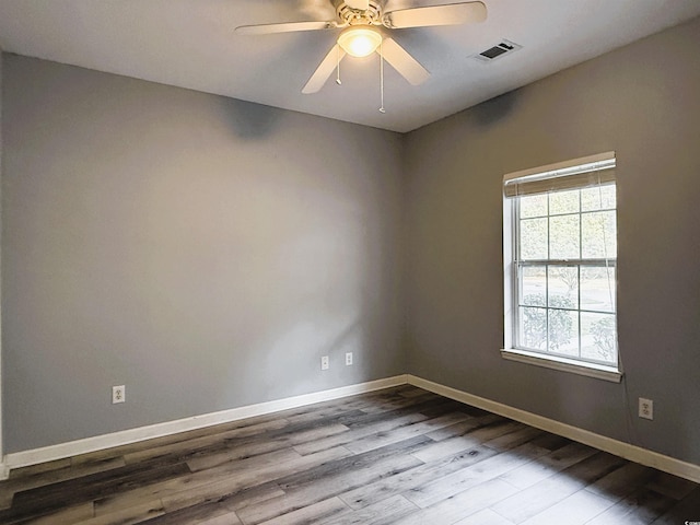 empty room featuring ceiling fan and light wood-type flooring