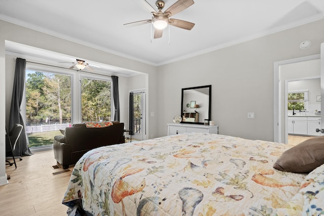 bedroom featuring light hardwood / wood-style floors, multiple windows, crown molding, and ceiling fan