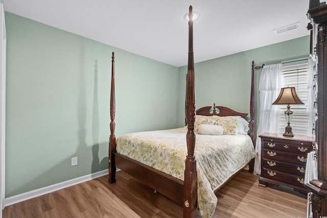 bedroom featuring light wood-type flooring