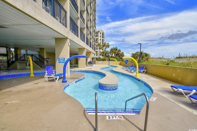 view of pool with a patio area