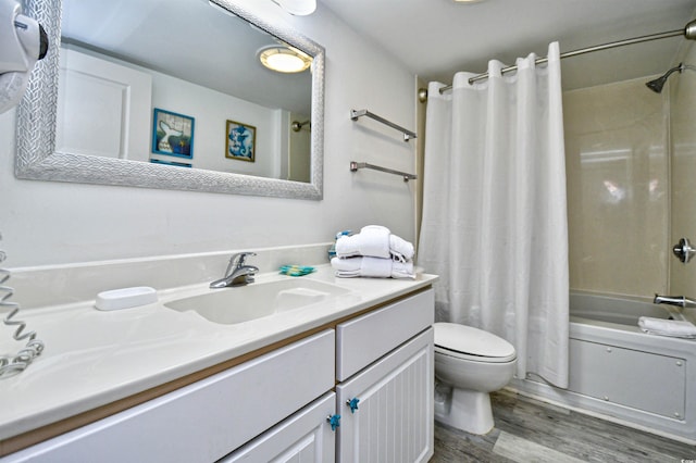 full bathroom with vanity, toilet, wood-type flooring, and shower / tub combo with curtain