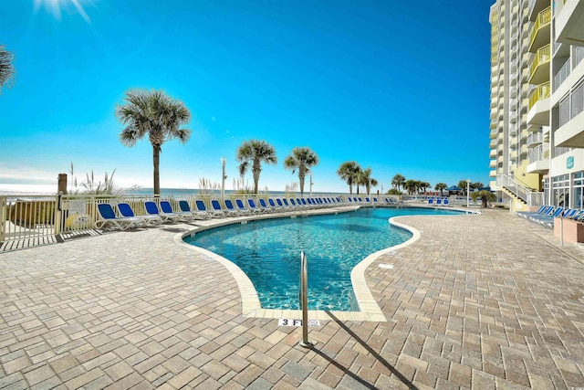 view of pool with a patio area