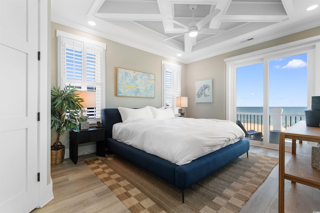 219 S Seaside Dr, Surfside Beach, SC 29575 - bedroom with coffered ceiling, crown molding, access to exterior, recessed lighting, and light wood-style floors