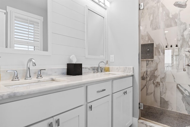 bathroom featuring vanity and walk in shower