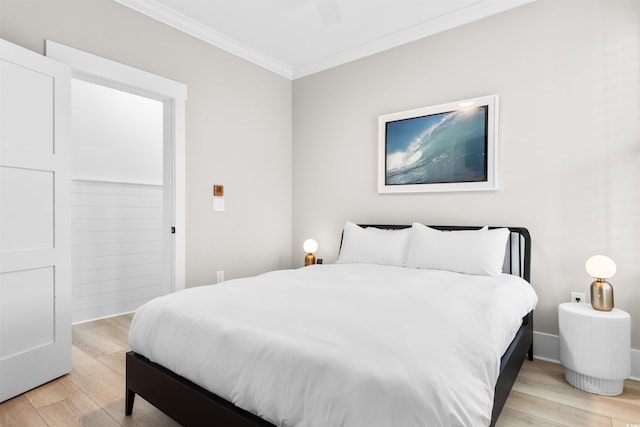 219 S Seaside Dr, Surfside Beach, SC 29575 - bedroom with ornamental molding, light wood finished floors, and ceiling fan