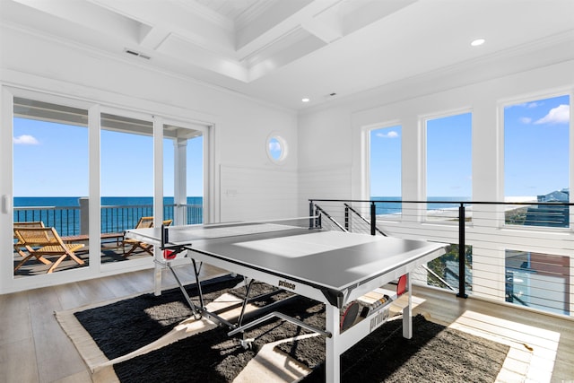 219 S Seaside Dr, Surfside Beach, SC 29575 - game room with crown molding, a water view, healthy amount of natural light, coffered ceiling, and hardwood / wood-style floors