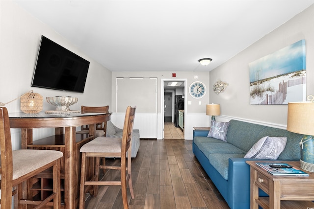 living room with dark wood-type flooring