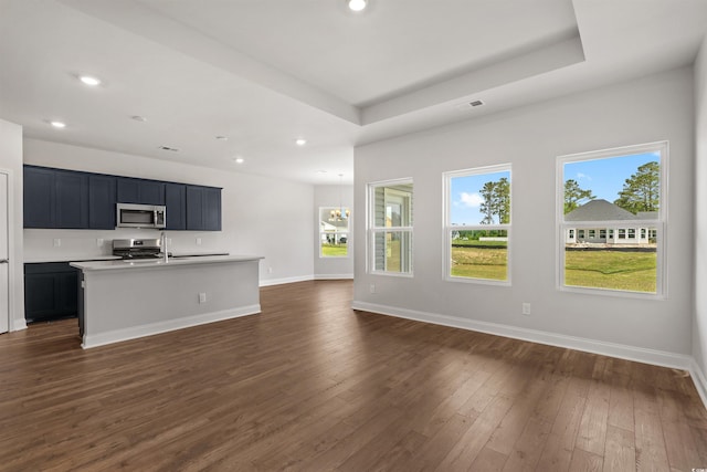 kitchen featuring open floor plan, visible vents, stainless steel appliances, and recessed lighting