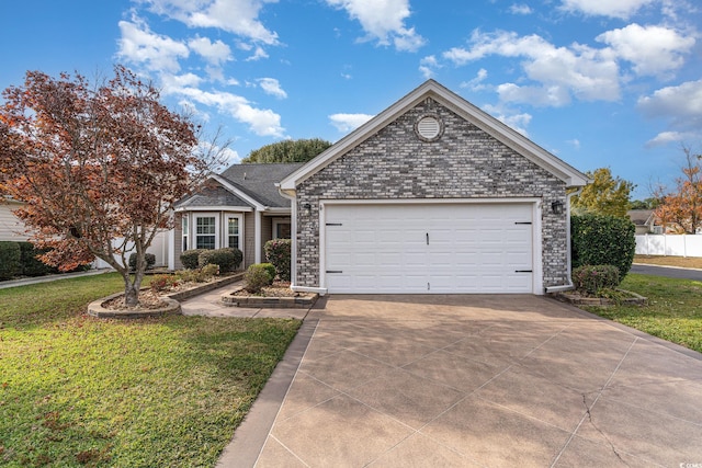 view of front facade featuring a garage and a front yard