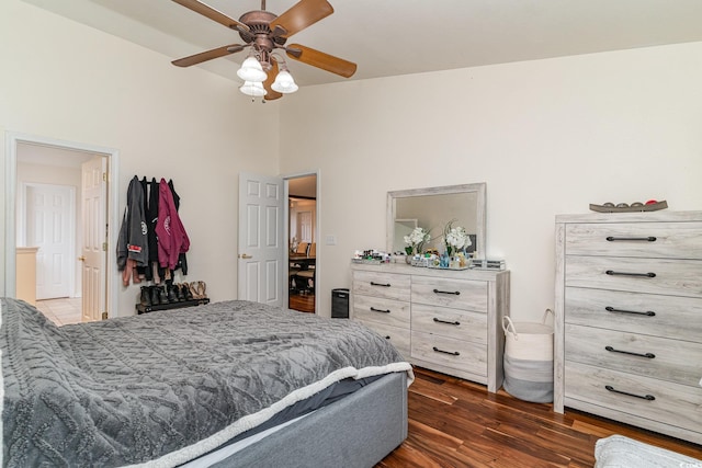 bedroom with ceiling fan and dark wood-type flooring