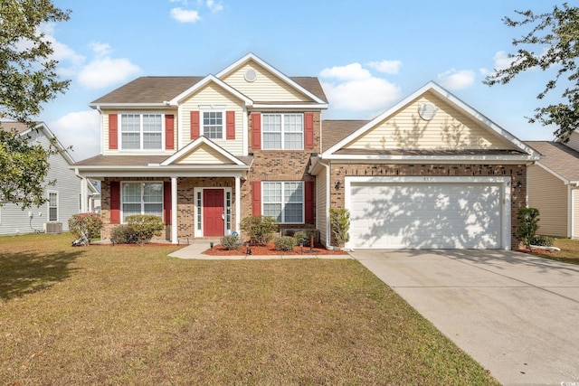 view of front of house featuring a front yard, central AC, and a garage