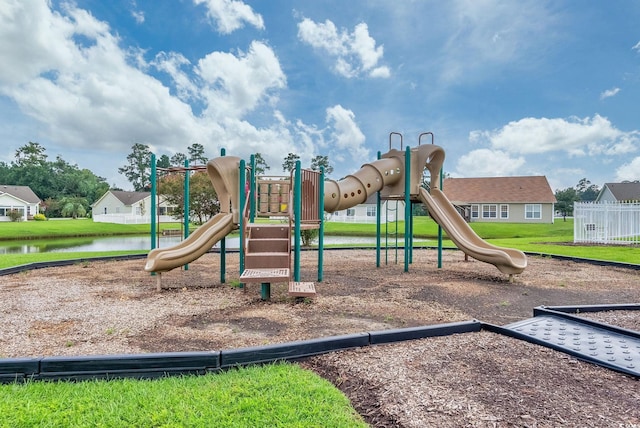 view of jungle gym featuring a water view