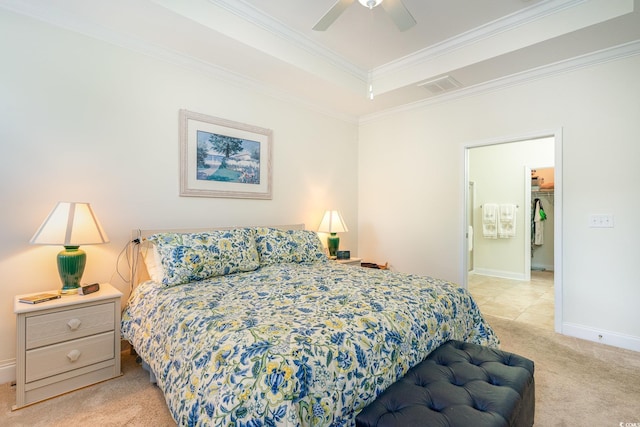 carpeted bedroom featuring ceiling fan and ornamental molding