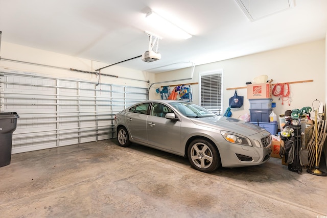 garage featuring a garage door opener