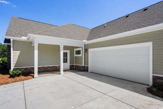 exterior space with a garage