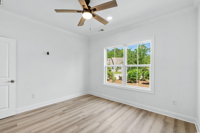 spare room with ceiling fan, light hardwood / wood-style floors, and ornamental molding