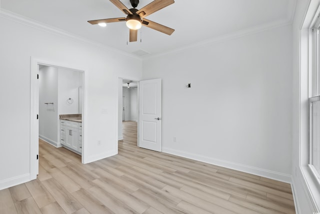 unfurnished bedroom with ceiling fan, light wood-type flooring, crown molding, and ensuite bath