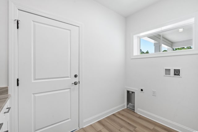 washroom with electric dryer hookup, light wood-type flooring, and hookup for a washing machine