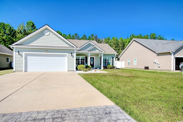 view of front facade with a front lawn and a garage