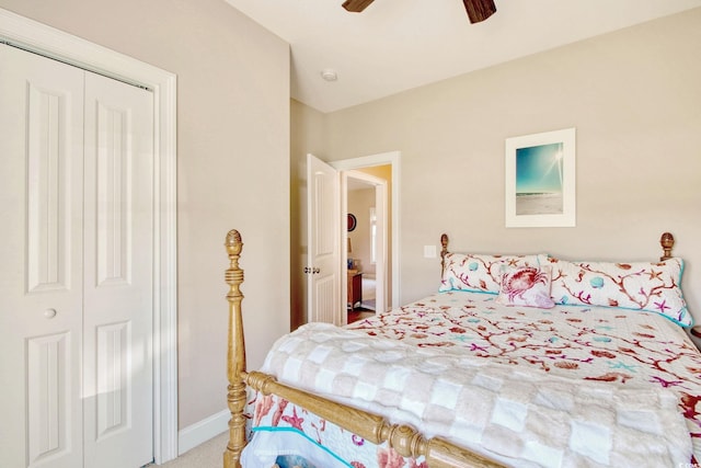 bedroom with carpet flooring, ceiling fan, and a closet