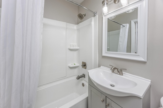 bathroom with shower / bath combo with shower curtain and vanity