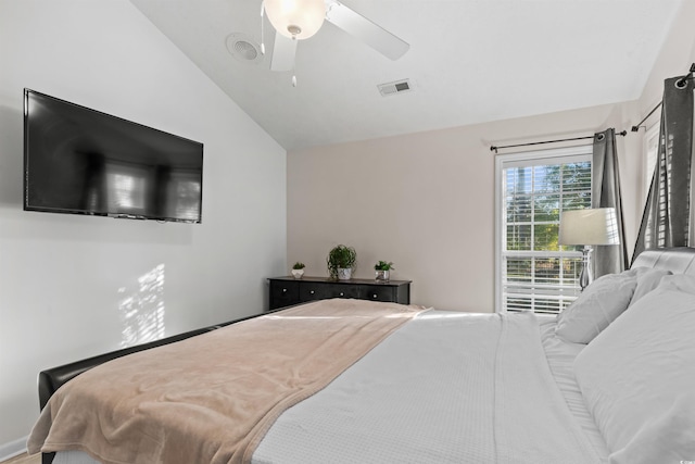 bedroom featuring ceiling fan and vaulted ceiling